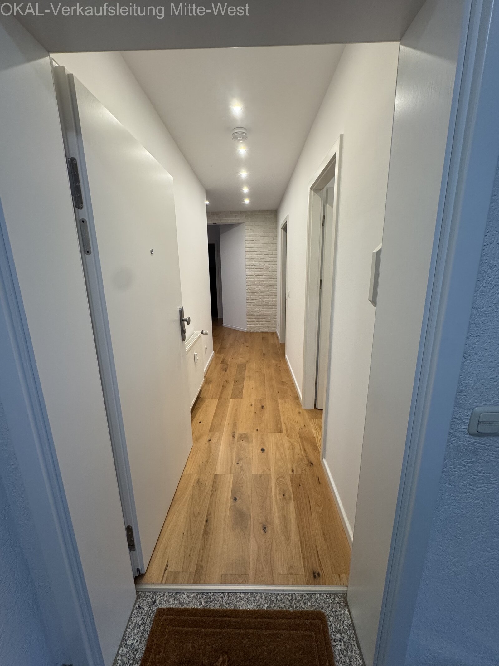 Top Renovierte Eigentumswohnung mit Balkon, Tiefgarage, Kellerraum und Gartenmitbenutzung