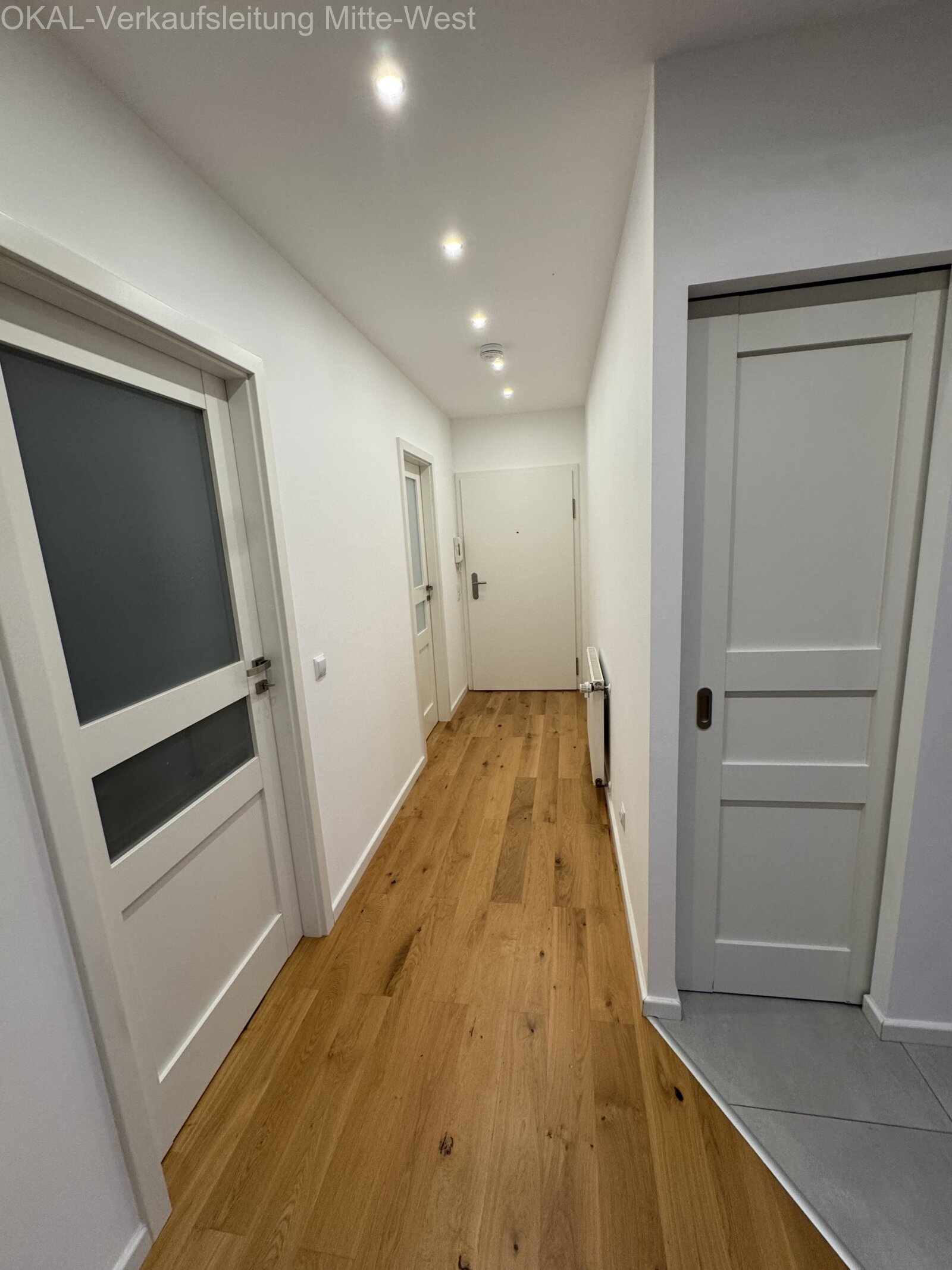 Top Renovierte Eigentumswohnung mit Balkon, Tiefgarage, Kellerraum und Gartenmitbenutzung