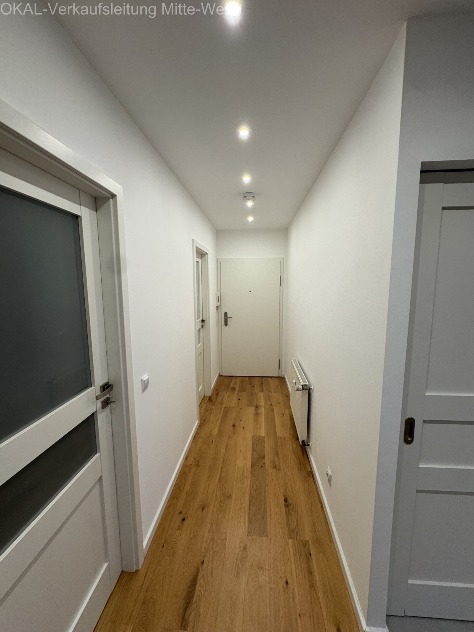 Top Renovierte Eigentumswohnung mit Balkon, Tiefgarage, Kellerraum und Gartenmitbenutzung